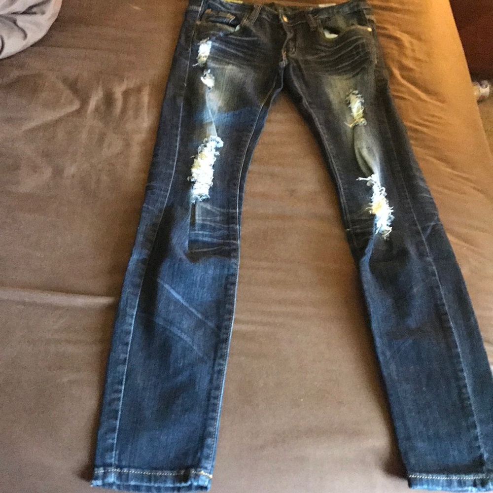 Dark blue ripped jeans